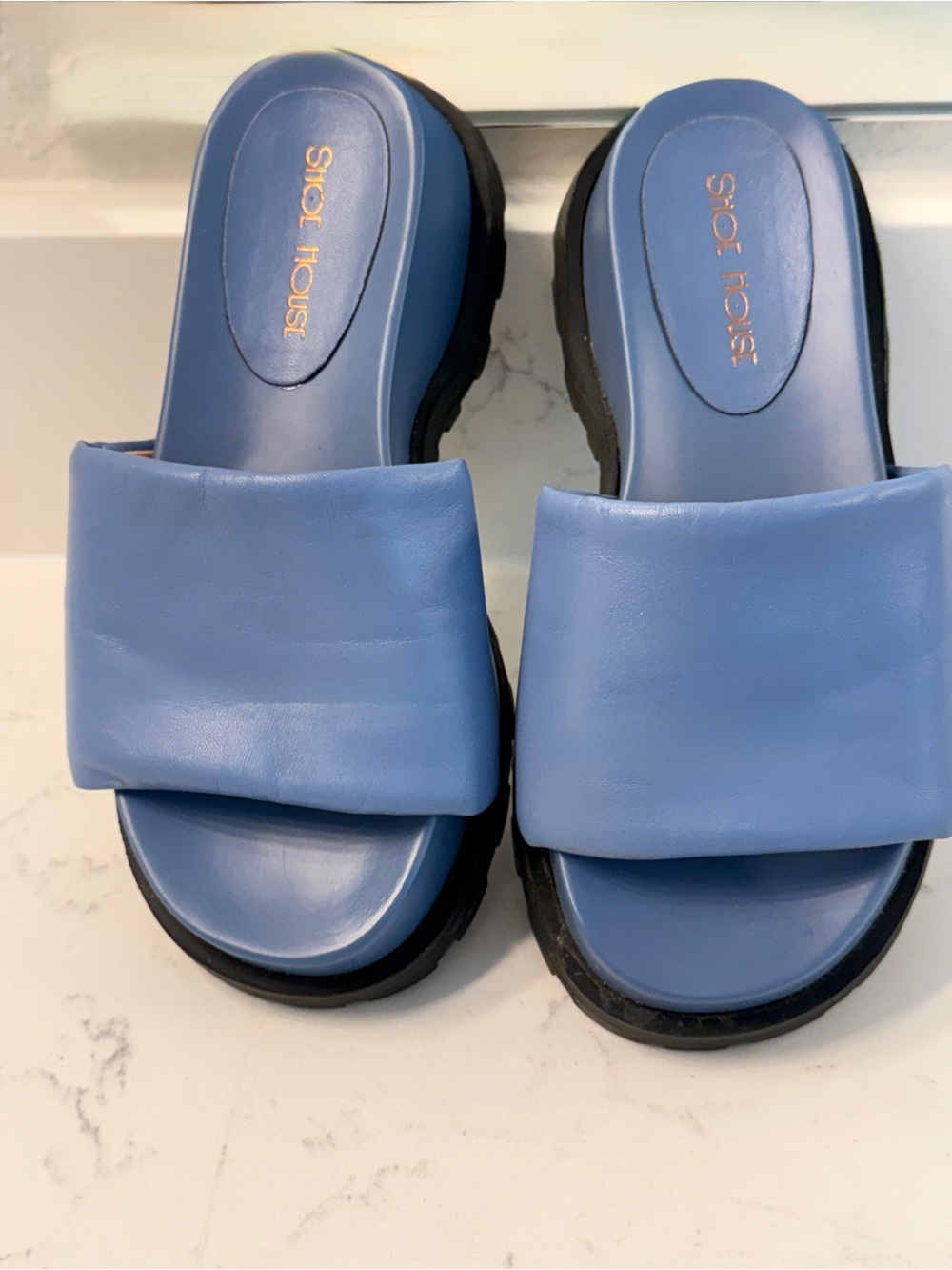 Women's Blue Slide Sandals with rubber lug outsole  worn once.